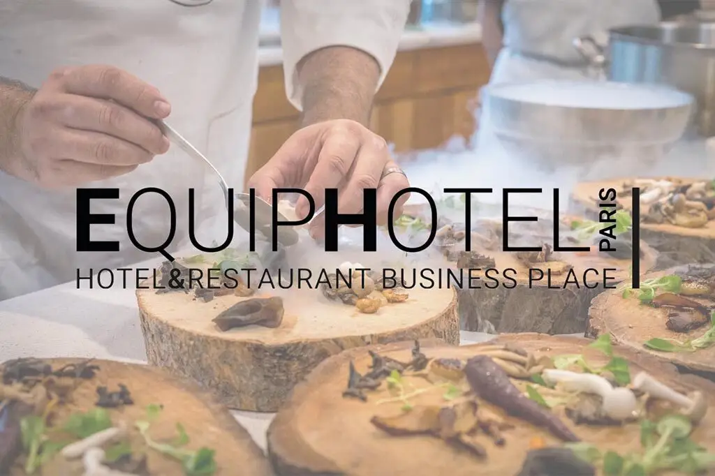 Chef preparing gourmet dishes at EquipHotel Paris.